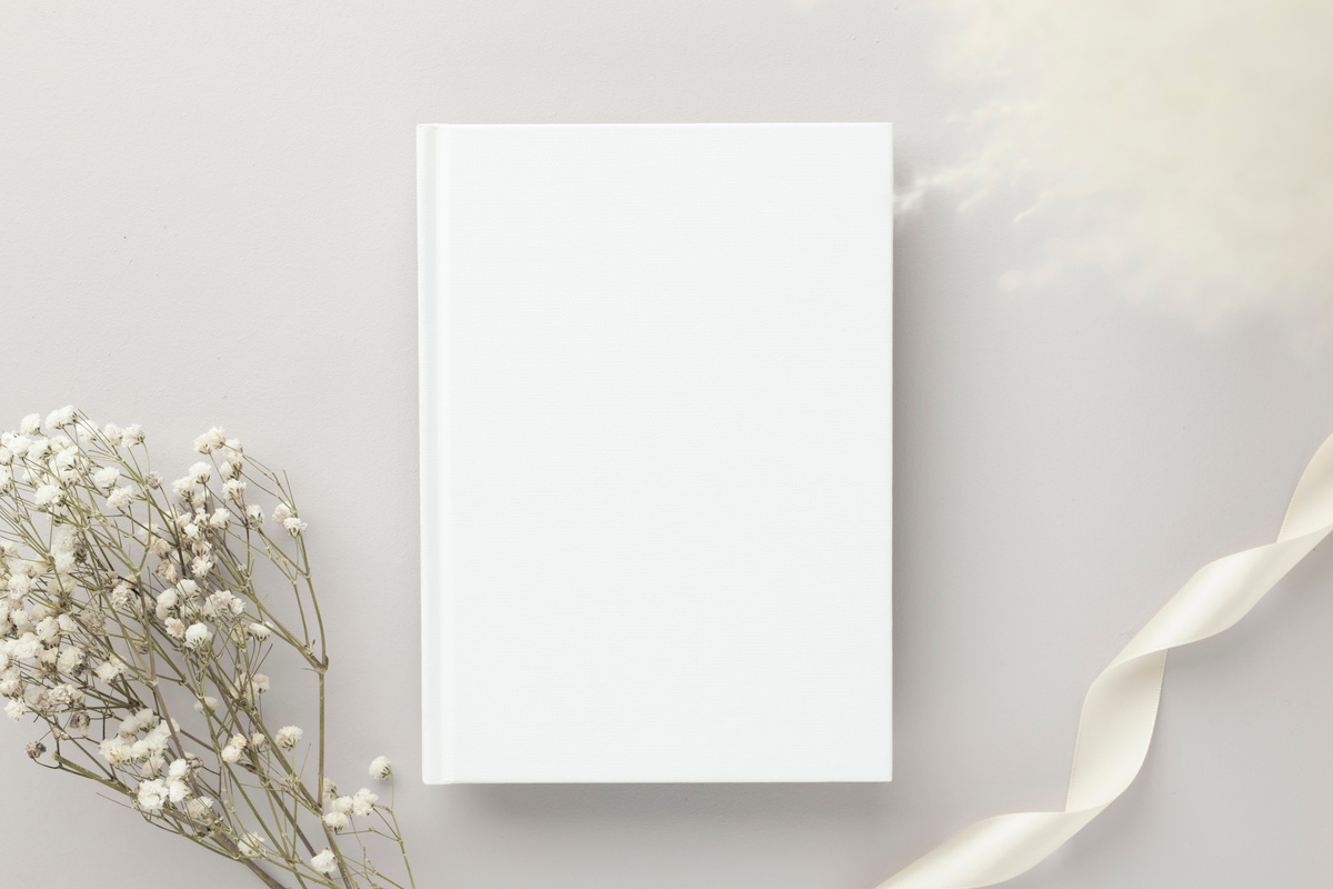 White book blank cover mockup on a beige background with dry